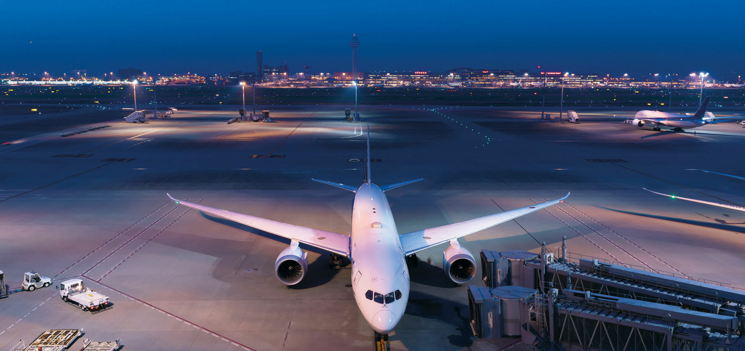 Plane on the runway at night